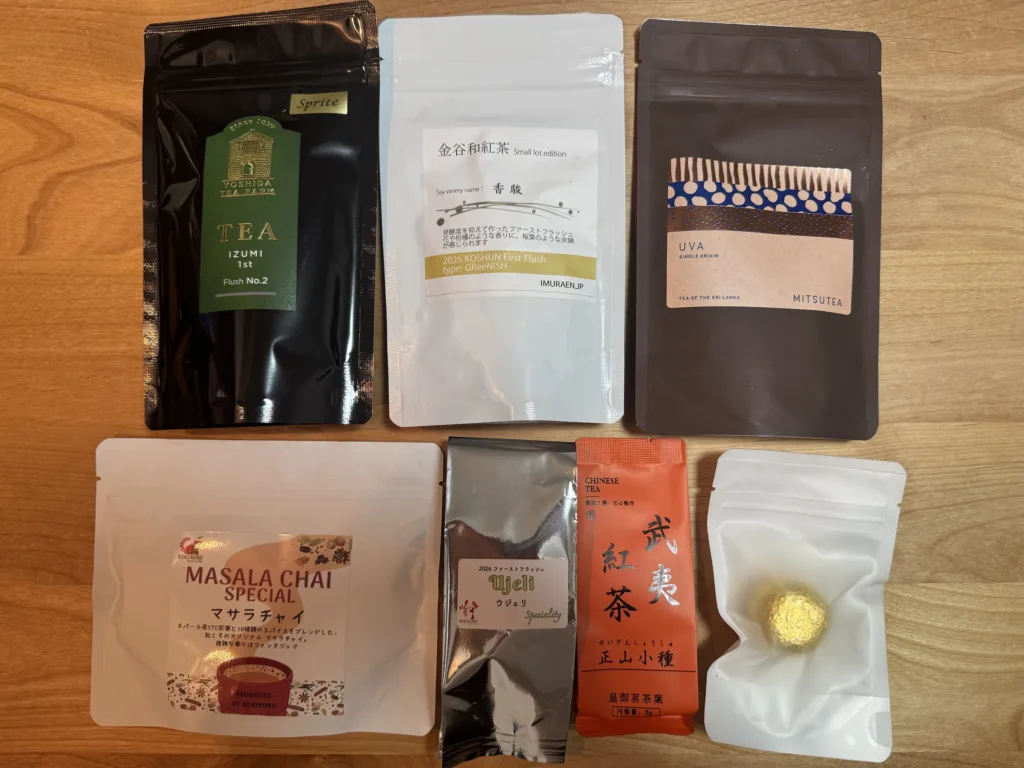 JAPAN TEA EXPO 2026 で買ったお茶。紅くろのマサラチャイとウジェリ、皇御茗の正山小種、MITSUTEA のマンダリンティーとウバ、吉田茶園のいずみ 1st、井村園の香駿